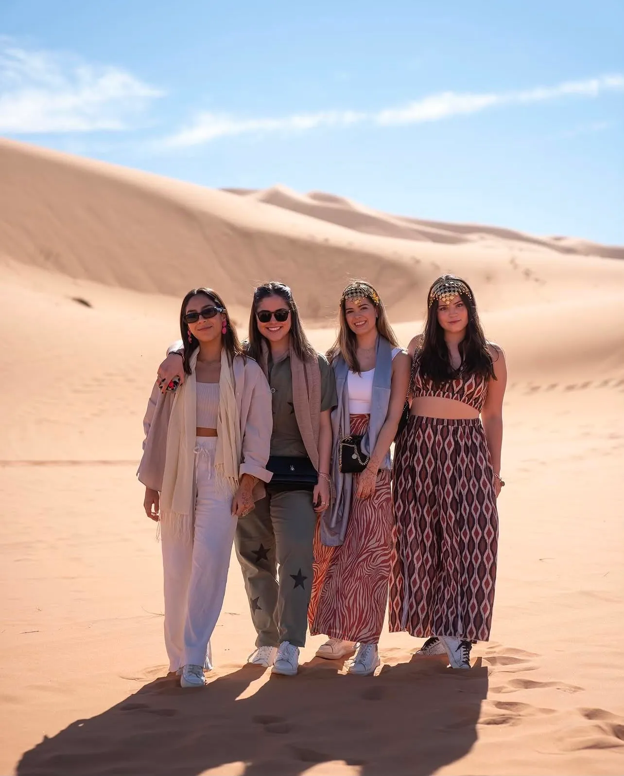 Scenic road through a Moroccan valley with kasbahs, on the route where travellers need cash for stops