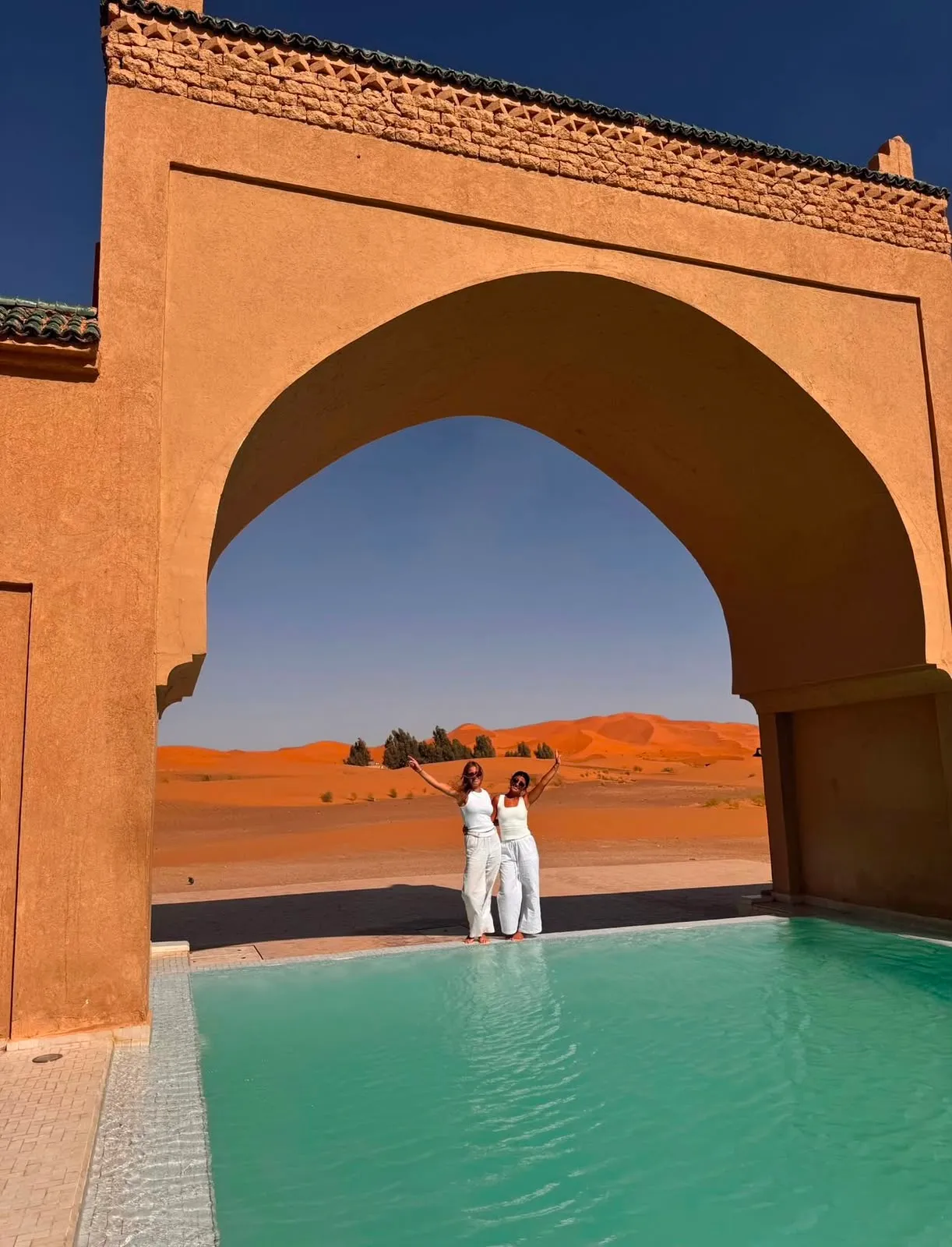 Luxury desert camp tent with a terrace facing the Erg Chebbi dunes in Merzouga