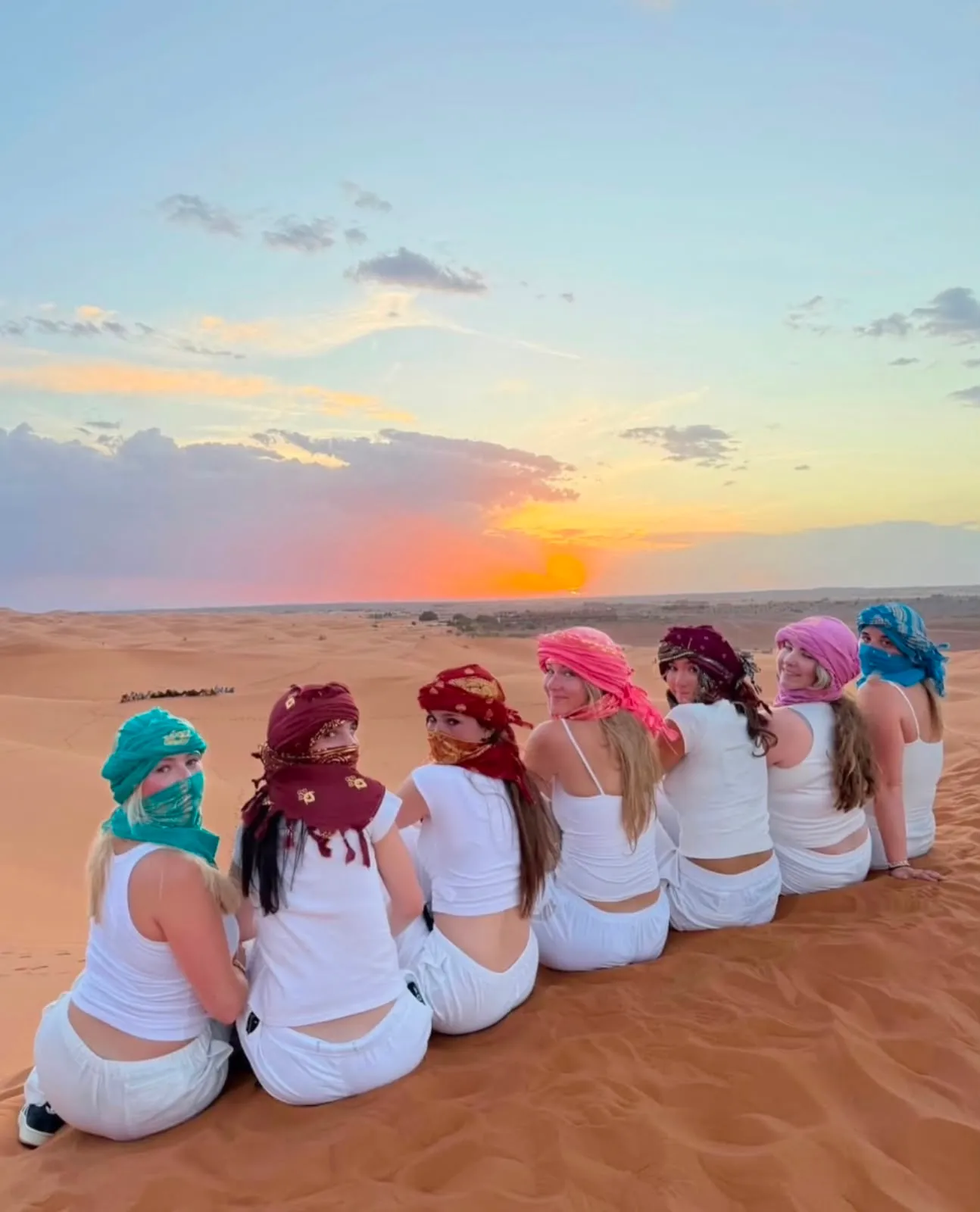Desert camp tents among the Erg Chebbi dunes on a tour from Fes to Marrakech